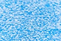 White snow abstract pattern on blue surface wall texture, winter, cold background Royalty Free Stock Photo