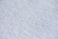 White snow closeup. Fluffy snow texture. Winter background with fresh snow