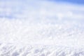 White snow closeup. Fluffy snow texture. Winter background with fresh snow