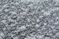 White snow surface on car window glass Royalty Free Stock Photo