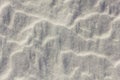 White snow surface with relief and shadows. natural texture Royalty Free Stock Photo