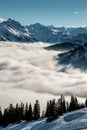Snow on the top of the mountains and fog down the valley Royalty Free Stock Photo