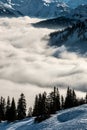 Snow on the top of the mountains and fog down the valley Royalty Free Stock Photo