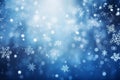 White snowfall crystal snow flakes on light blue background with blur bokeh Royalty Free Stock Photo