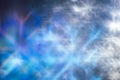 White snowflake bokeh on blue background â winter holiday abstract background, front view Royalty Free Stock Photo