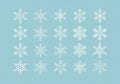 White snowflake designs are evenly arranged in four rows against a light blue background. Each Royalty Free Stock Photo