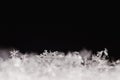 White snowflakes on black background Royalty Free Stock Photo