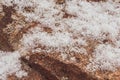 White snowflakes covered beautiful stone texture