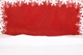 White snowflakes on red shiny background with snow. Frame for  announcement. Christmas, New Year Royalty Free Stock Photo