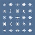 White snowflakes set isolated on blue background. Snow elements for Happy New Year and Merry Christmas holidays greeting Royalty Free Stock Photo