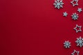 Christmas background.Stars and snowflakes on red background. Royalty Free Stock Photo