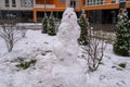white snowman with carrot nose, made of snow, snowperson Royalty Free Stock Photo
