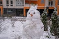 white snowman with carrot nose, made of snow, snowperson Royalty Free Stock Photo