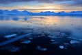 White snowy mountain, blue glacier Svalbard, Norway. Ice in ocean. Iceberg twilight in North pole. Pink clouds with ice floe. Beau Royalty Free Stock Photo