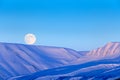 White snowy mountain with Moon, blue glacier Svalbard, Norway. Ice in ocean. Iceberg twilight in North pole. Pink clouds with ice