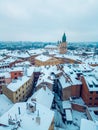 white snowy winter at European old town Lublin, snow storm and snowfall over roof at ancient Poland, Europe aerial