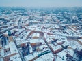 white snowy winter over European old town Lublin, snow storm and snowfall at ancient district of Poland, Europe aerial