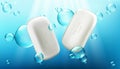 White soap bars on blue background with bubbles Royalty Free Stock Photo