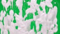 White soap foam with bubbles flowing down the window glass on green screen chroma key background. Cleaning windows with Royalty Free Stock Photo