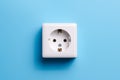 White socket isolated on a blue background. Electric lighting Royalty Free Stock Photo