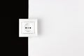 White socket on paper black and white background. The concept of electricity in the house. Place for text Royalty Free Stock Photo