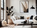 White sofa and black coffee table against white wall with art poster. Scandinavian boho home interior design of modern living room Royalty Free Stock Photo