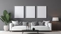 White sofa and posters, frames on gray wall. Interior design of modern living room Royalty Free Stock Photo