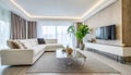 White sofa and tv unit in spacious room. Luxury home interior design of modern living room, panorama Royalty Free Stock Photo