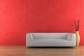 White sofa and vase in front of red wall Royalty Free Stock Photo