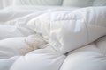 white soft duvet lying on the background of the bed,close-up,the concept of preparing for the winter season,household chores, Royalty Free Stock Photo