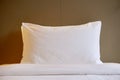 White soft pillow and bed sheet in room at the hotel resort. Royalty Free Stock Photo