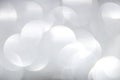 White and soft silver bokeh, Defocused abstract background for Christmas, New year, Valentines and romantic background