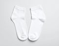 White, soft socks isolated in top view. Royalty Free Stock Photo