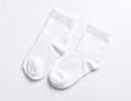 White, soft socks isolated in top view. Royalty Free Stock Photo