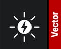 White Solar energy panel icon isolated on black background. Sun with lightning symbol. Vector Royalty Free Stock Photo