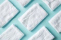 White spa towels on blue, from above Royalty Free Stock Photo