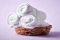 White spa towels on purple background Royalty Free Stock Photo