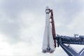 white space rocket at the launch. A rocket on the background of a blue cloudy sky