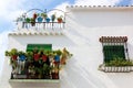 White Spanish house with balconies and plants Royalty Free Stock Photo