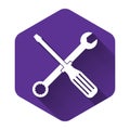 White Spanner and screwdriver tools icon isolated with long shadow. Service tool symbol. Purple hexagon button Royalty Free Stock Photo