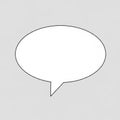 A white speech bubble with a black outline on a light gray background Royalty Free Stock Photo