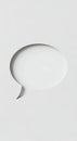 White Speech Bubble Cutout on Minimalist White Background for Communication or Dialogue Concept Royalty Free Stock Photo