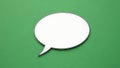 White speech bubble on green background Royalty Free Stock Photo