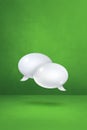 White speech bubbles on green vertical background Royalty Free Stock Photo