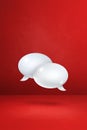 White speech bubbles on red vertical background Royalty Free Stock Photo