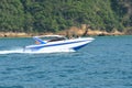 White speed boat on blue sea water