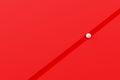 White sphere moving on or following a path on red background with copy space