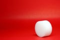 White Spherical plastic or Shockproof foam isolated red background - geometric shapes and decor Royalty Free Stock Photo