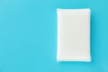 White sponge net on a blue color background Royalty Free Stock Photo