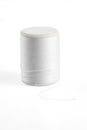 White spool has shadow on white background. Royalty Free Stock Photo